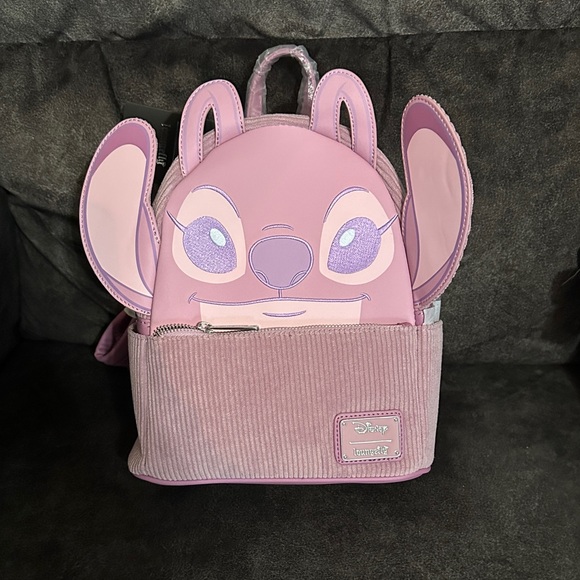 Loungefly Handbags - NWT Loungefly Angel from Disney Stitch Backpack Hardtag